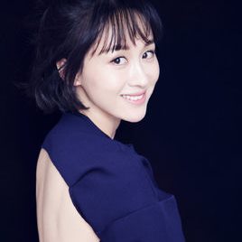 练束梅照片